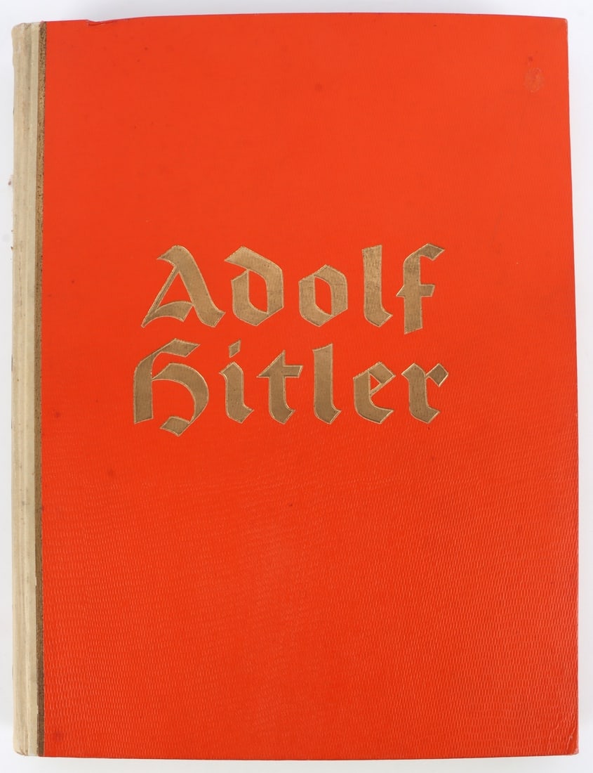 WWII GERMAN THIRD REICH ADOLF HITLER PHOTO ALBUM: A photo album of Adolf Hitler, largely derived from post cards. This is a complete photo set. With brown cardboard cover.