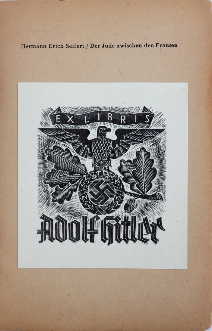 WWII GERMAN THIRD REICH BOOK WITH HITLER EX LIBRIS: A German language book, Der Jude Zwischen den Fronten, featuring a Hitler ex libris stamp.