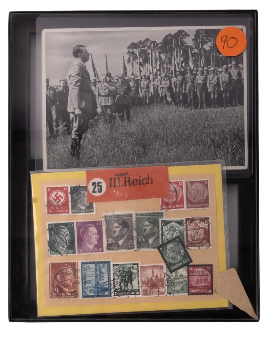 WWII GERMAN THIRD REICH HITLER PAPER EPHEMERA: A photograph and several stamps depicting Adolf Hitler. In a frame.