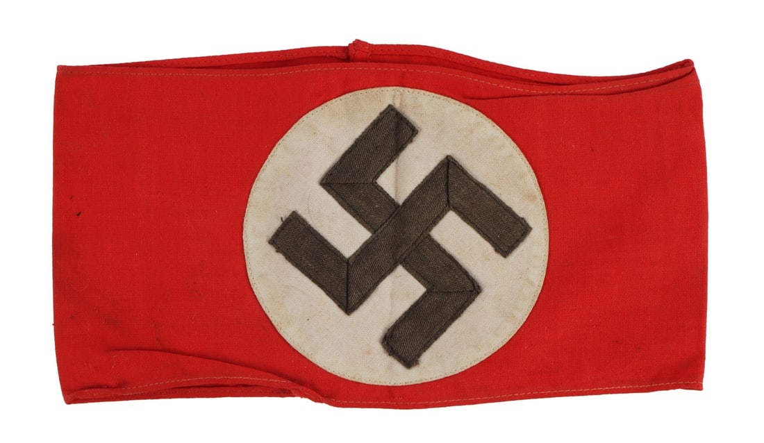 WWII GERMAN NSDAP ARMBAND COTTON WITH RZM TAG: Cotton armband, multi-piece construction. Interior has paper RZM tag. Laid flat, measures 7.75 x 4 inches.