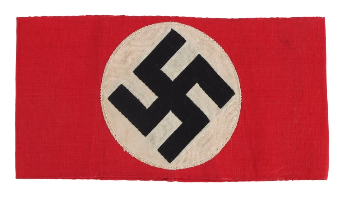 WWII GERMAN SA ARMBAND MULTI-PIECE COTTON: Early SA armband, multi-piece construction, cotton. Swastika embroidered in black thread. Flat, measures 8.5 x 4.5 inches.