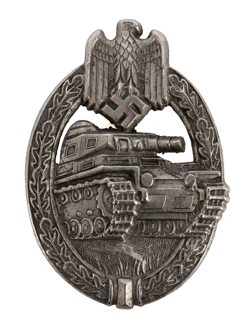 SILVER WWII GERMAN REICH PANZER ASSAULT BADGE: WWII Third Reich German panzer assault badge. Silver plated finish. Marked Hermann Aurich Dresden. Measures 2.40 x 1.60 inches. This lot has a reserve.