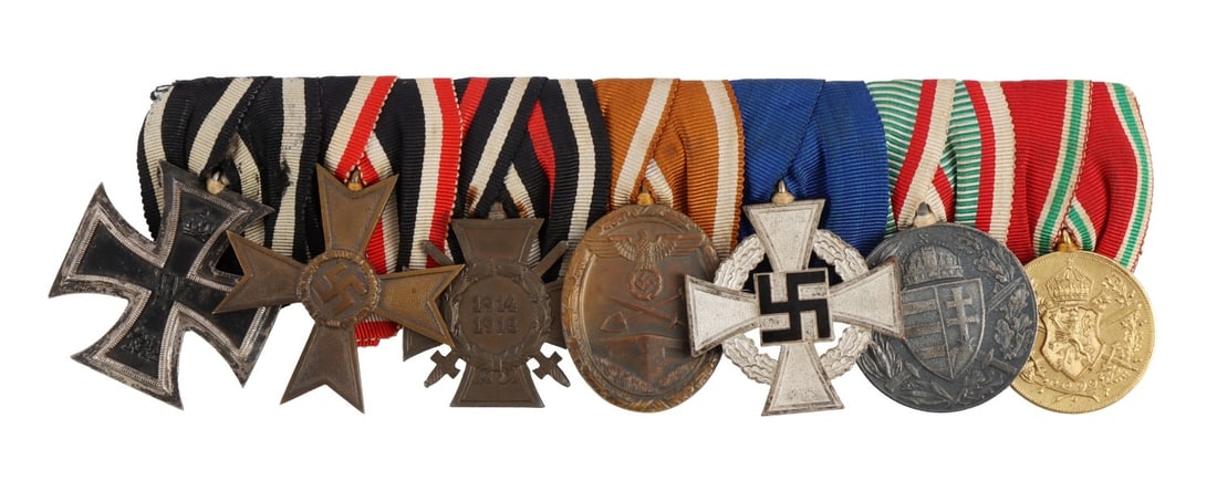 WWI & WWII GERMAN DECORATION MEDAL BAR SET OF 7: Seven (7) medals in total. WWI Iron cross first class. Golden knights cross. WWI Cross of Honour. West wall medal. 25 Year Faithful Service Medal. Hungarian WWI Combatant Medal 1914-1918. Bulgarian Co