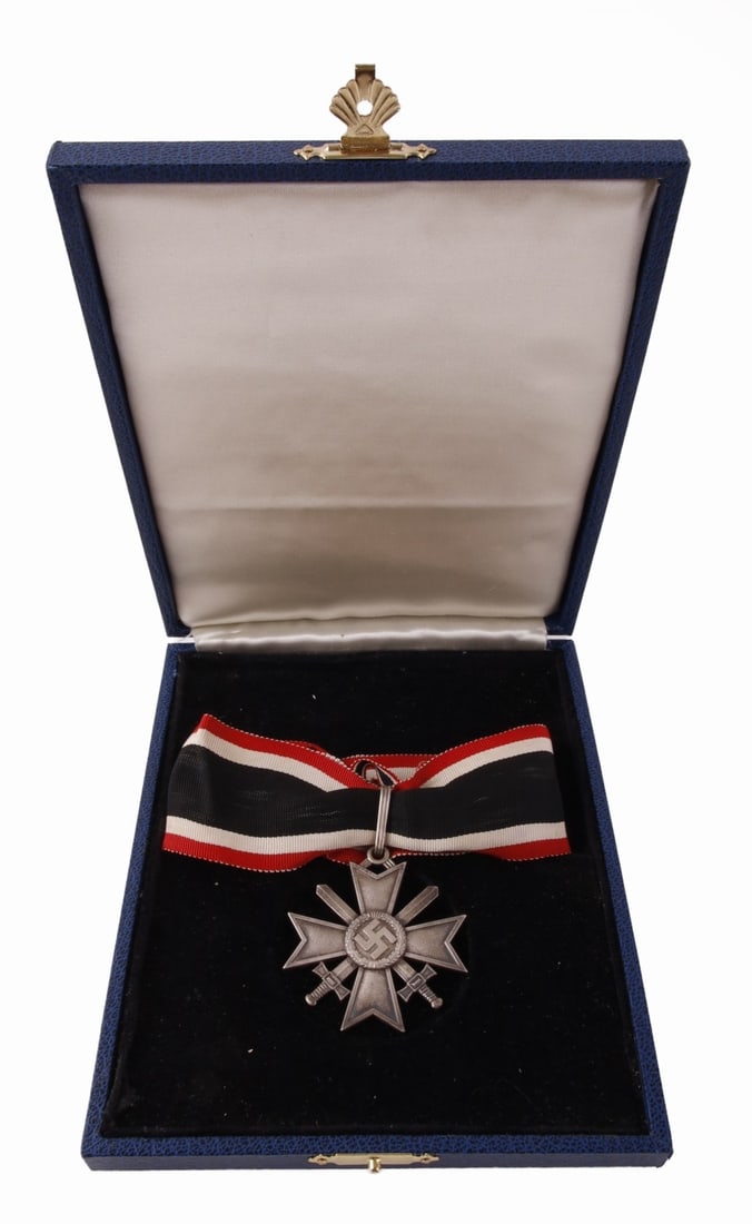 WWII GERMAN KNIGHTS WAR MERIT CROSS IN SILVER: Knight's War Merit Cross. Marled 900 for silver and 1 for Deschler firm. It measures 2 inches. Weighs 43 grams. This lot has a reserve.