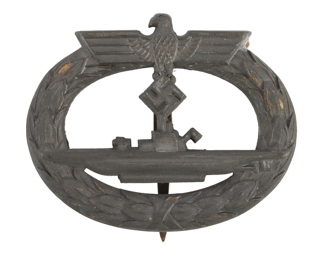 WWII GERMAN KRIEGSMARINE U-BOAT WAR BADGE: Solid-struck, tombac. Reverse has vertical tapered pin with flat wire catch. No maker's mark, probably Steinhauer & Luck. Gross weight 22 grams.