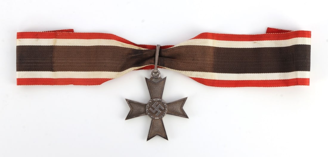 WWII GERMAN REICH KNIGHTS WAR MERIT CROSS: .800 silver construction. Marked on lower arm. Comes with non-fluorescing ribbon. Measures 2 1/8 inches. Never awarded. Intended for display only. This lot has a reserve.
