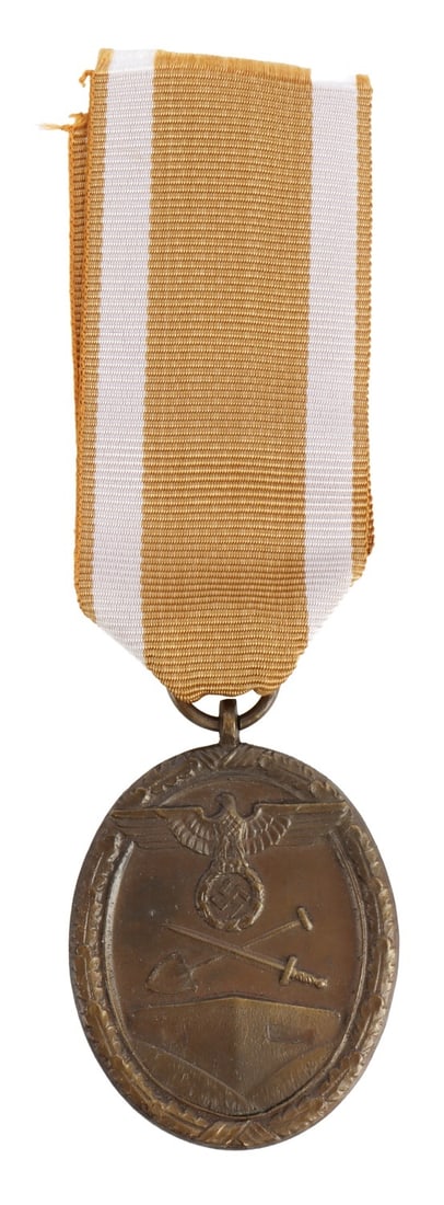 WWII GERMAN WEST WALL MEDAL: In bronzed zinc alloy. Ribbon is a modern replacement.