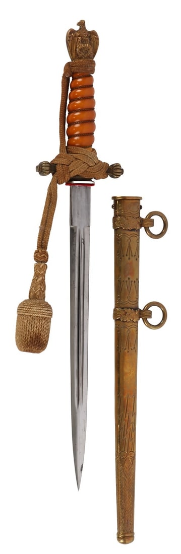 WWII GERMAN REICH KRIEGSMARINE OFFICER DAGGER: A dagger for a senior officer of the Kriegsmarine. Etched gilded scabbard, gold bullion portepee, brown Bakelite handle. Pommel is an eagle with swastika. Nickel plated blade. Blade made by Alcoso. 10