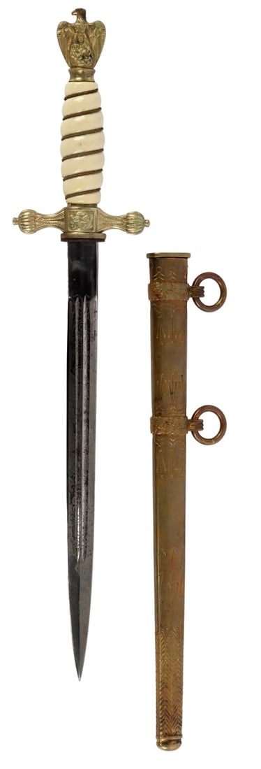 WWII GERMAN REICH KRIEGSMARINE OFFICER DAGGER: A dagger for an officer of the Kriegsmarine. Gilded etched scabbard. Eagle with swastika for pommel. F. W. Holler maker's mark. 10.1 inch blade,
