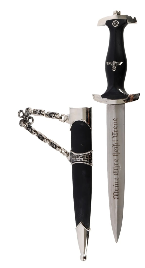 WWII GERMAN THIRD REICH SS CHAINED DAGGER: A chained dagger for the SS of the German Third Reich. 'Stainless China' marked on back of dagger. This is a post-war modern historic interpreter's piece.