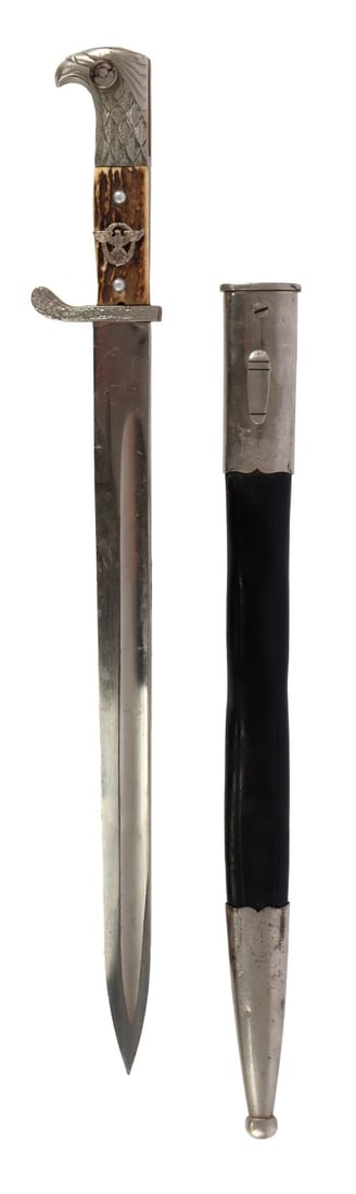 WWII GERMAN POLICE DRESS BAYONET ALCOSO: German Ordnungspolizei bayonet with leather scabbard. Ricasso has Alcoso Solingen maker's mark. Spine of blade stamped "K5." Blade length 13 inches. Overall length 17.5 inches.