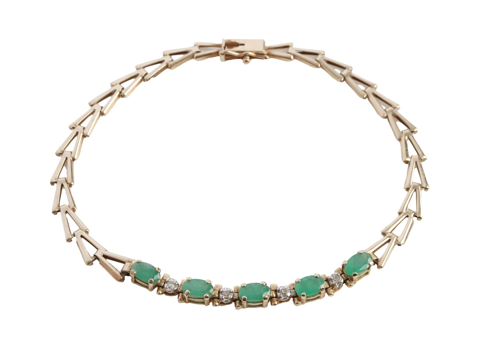 10K GOLD LINK BRACELET WITH DIAMONDS & EMERALDS: 10K gold link bracelet with diamonds and emeralds. 4 round cut accent diamonds and 5 oval cut Colombian emeralds approximately 5x3.14 mm each. Approximately 7.75 inches in length. Dated 1985 to 1990.