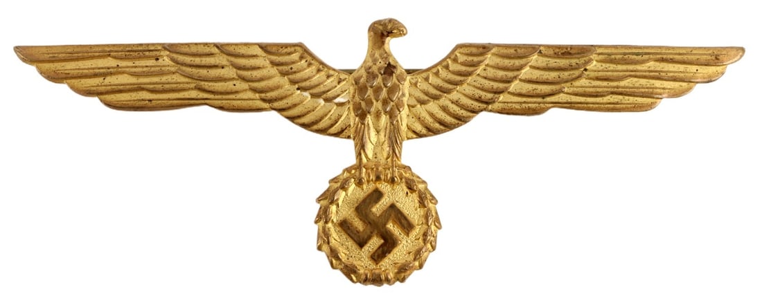 WWII GERMAN HEER GENERAL'S UNIFORM BREAST EAGLE: Heer or Kriegsmarine General's summer uniform breast eagle of copper alloy. Reverse has horizontal round wire pin and vertical prong. Width 3.75 inches. Height 1.35 inches.