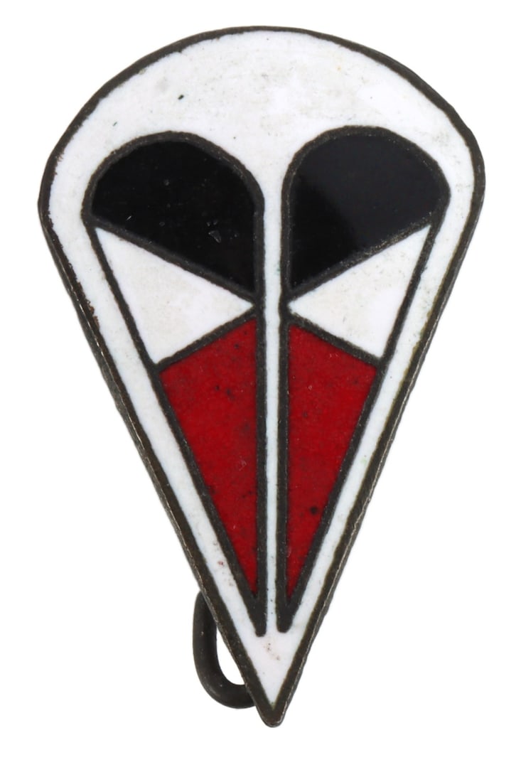 WWII LUFTWAFFE FALLSCHIRMJAGER ENAMEL DUI PIN: Scarce 1.Fallschirm Korps enamel distinctive unit insignia. Produced in Italy by the G. Bregonzio factory in Milan in 1944. Worn as a cap device on the M43 field cap. Reverse has thin wire pin, safety