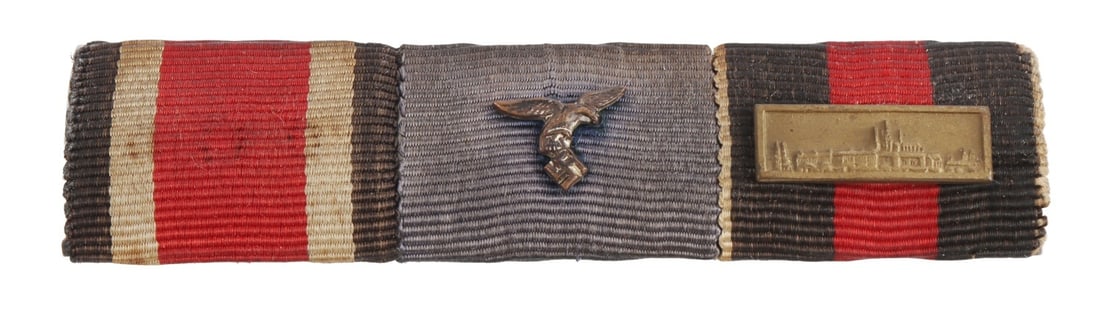 WWII GERMAN THIRD REICH LUFTWAFFE RIBBON BAR: A ribbon bar for a member of the Luftwaffe. Three medals, including the Iron Cross.