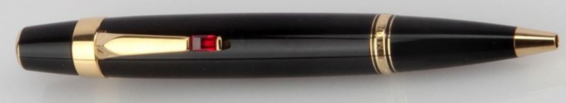 MONTBLANC BOHEME METAL GOLD PLATED BALLPOINT PEN: One Montblanc Boheme metal gold-plated rouge ruby ballpoint pen, measuring 4.25 inches long. Includes original case.