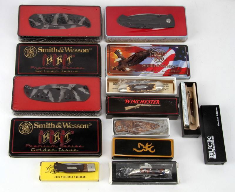 8 COLLECTIBLE FOLDING KNIVES VARIOUS BRAND NIB: Grouping of eight collectible folding pocket knives, all mint in original package. Browning # 322070; Winchester WR17035; BuckB503-LE-O; Schrade Old Timer 30T; two Smith & Wesson H R T Premium Series