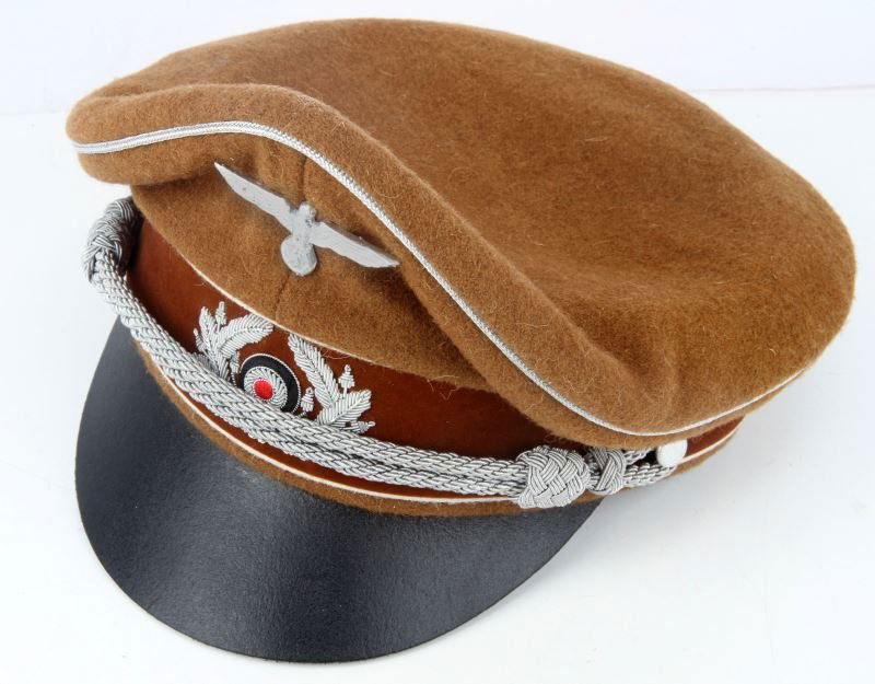 GERMAN NSDAP POLITICAL LEADER'S CAP REPRODUCTION: Visor is a size 50 and features the Wehrmacht insignia. Overall in very good condition.