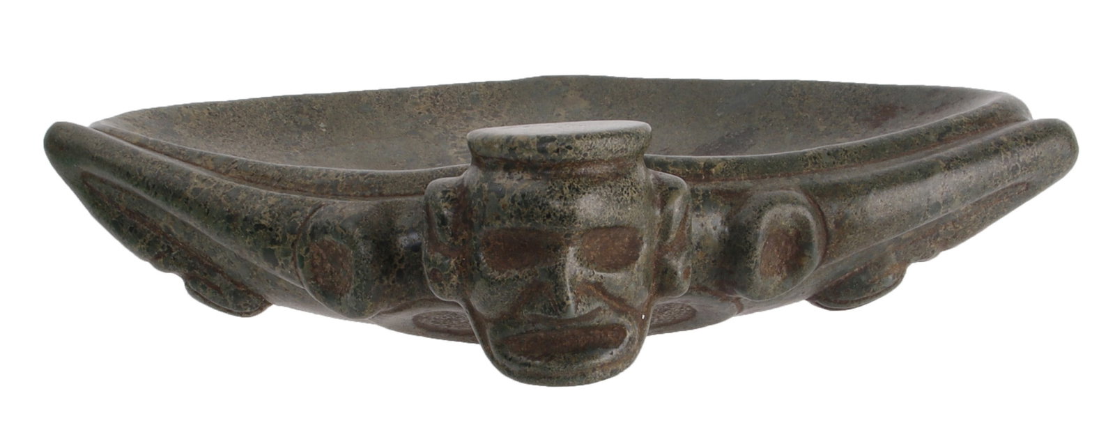 TAINO TRIANGULAR ANTHROPOMORPHIC OWL BOWL: A finely formed, triangular anthropomorphic-owl bowl. Embossed arms extend from the head across the front of the bowl while the hands rest on the base. The subject's legs are relief-carved along the b