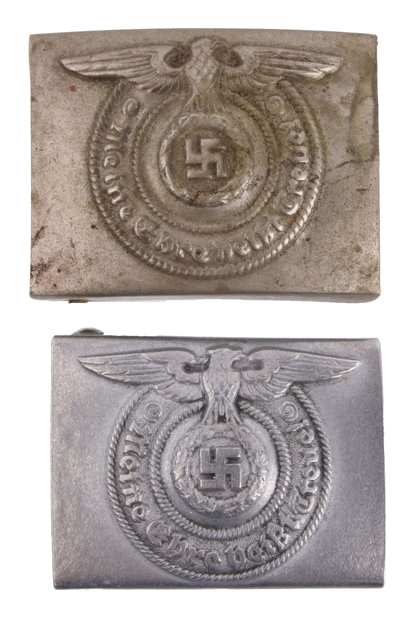 WWII GERMAN SS OFFICER EM BELT BUCKLES: Pair of belt buckles with SS motto. One is marked RZM 822/37 SS. Unauthenticated, sold as is. This lot has a reserve.
