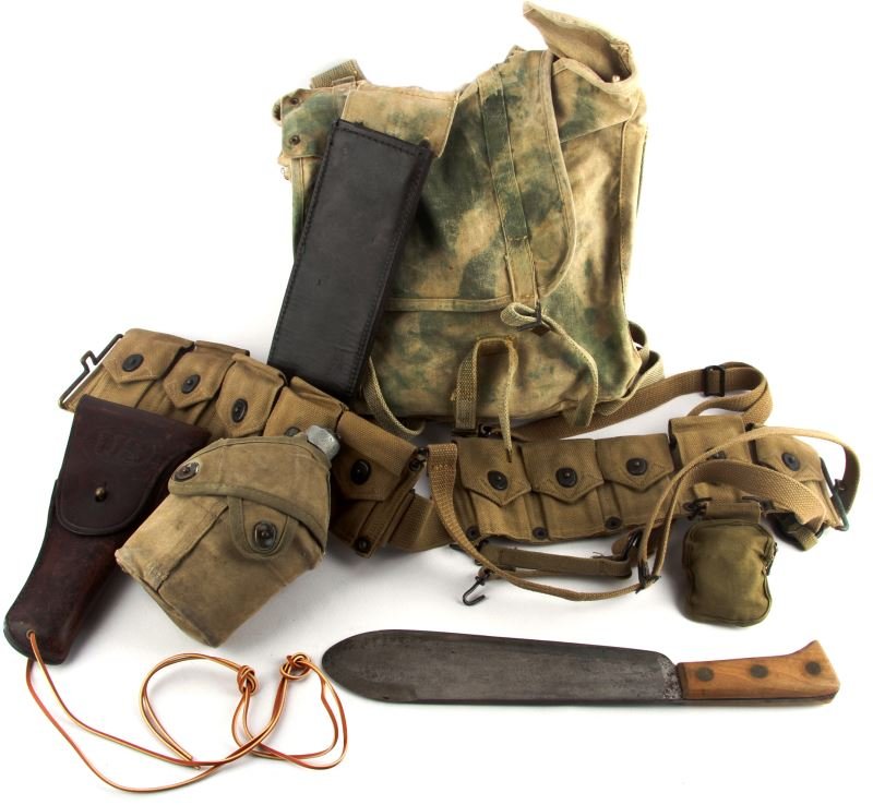 WWII USMC BOLO HAVERSACK COMPASS BELT CANTEEN: Gear lot consisting of USMC marked Bolo knife with Haversack and carry rig, Ammo belt , USMC cross flap canteen, leather A11 holster, Gurley compass with case attached to ammo belt, working pointing t