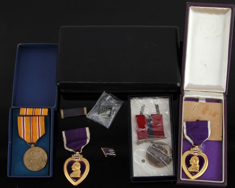 WWII VIETNAM NAMED PURPLE HEART MEDALS 1 USMC: Boxed WWII Purple Heart and ribbon, named to Ancle E. Marina T5, the second Vietnam era named to PFC Elmo R. Bridges USMCR, boxed, also WWII USMC Pacific Theatre medal with box, and a later Good Condu