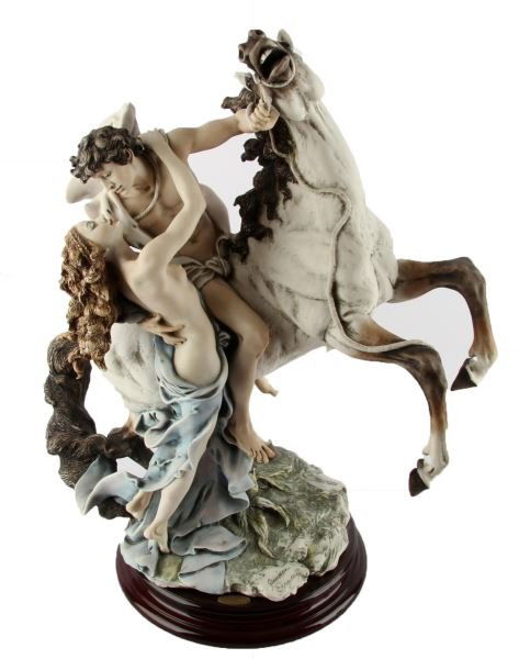 G. ARMANI THE EMBRACE CAPODIMONTE 2258/3000: Guiseppe Armani porcelain sculpture "The Embrace" limited edition numbered 2258/3000. Marked with Capodimonte "N" Crown; made in Italy. In excellent condition with no chips, cracks, or detractions.
