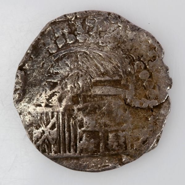 ATOCHA SHIPWRECK 4 REALE COIN GRADE 1 WITH COA: Mel Fisher signed COA, Potosi mint four Reale. 13.3 grams Philip, date obscured.