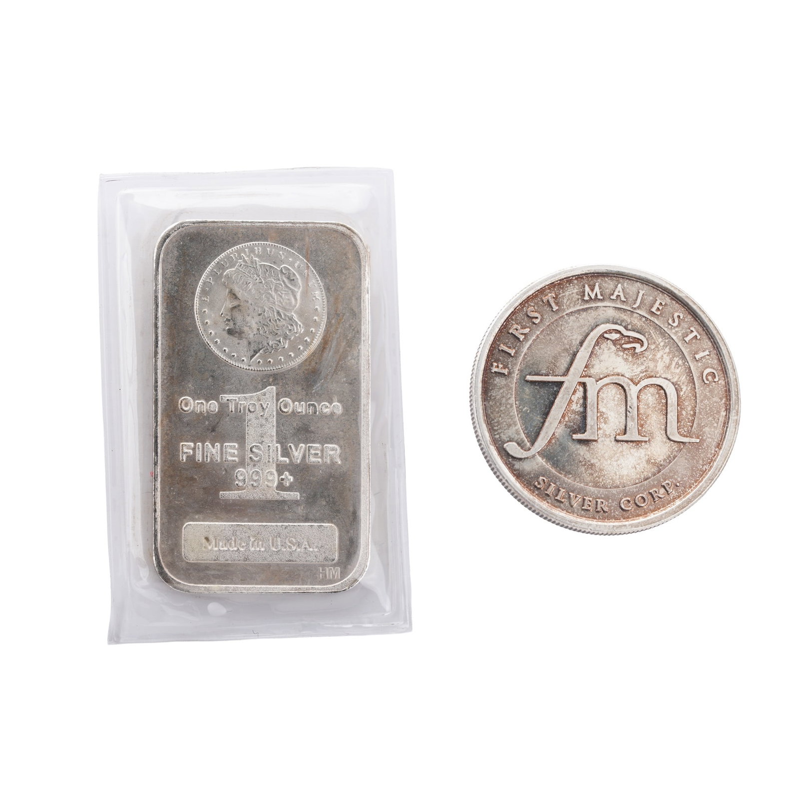 Two 1 Troy Ounce Silver Bar and Round: Guaranteed silver.