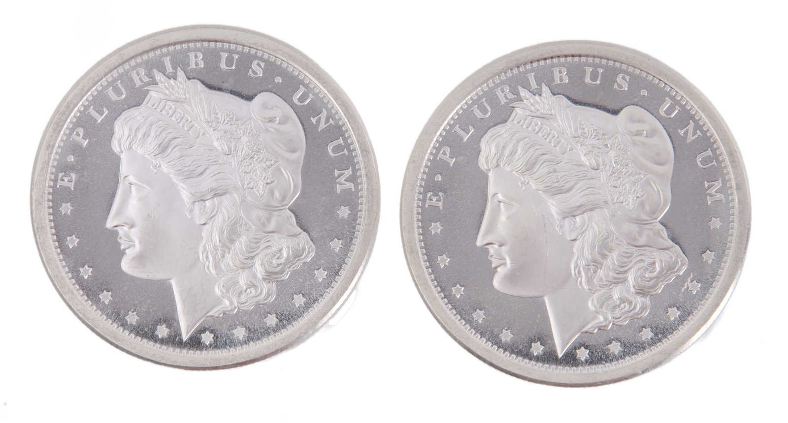 Two 1 Troy Ounce .999 Silver Morgan Rounds: Morgan silver dollar design. This lot has a reserve.