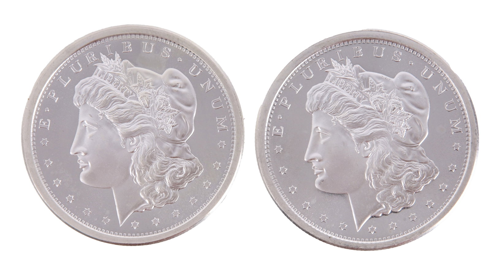 Two 1 Troy Ounce .999 Silver Morgan Rounds: Morgan silver dollar design. This lot has a reserve.