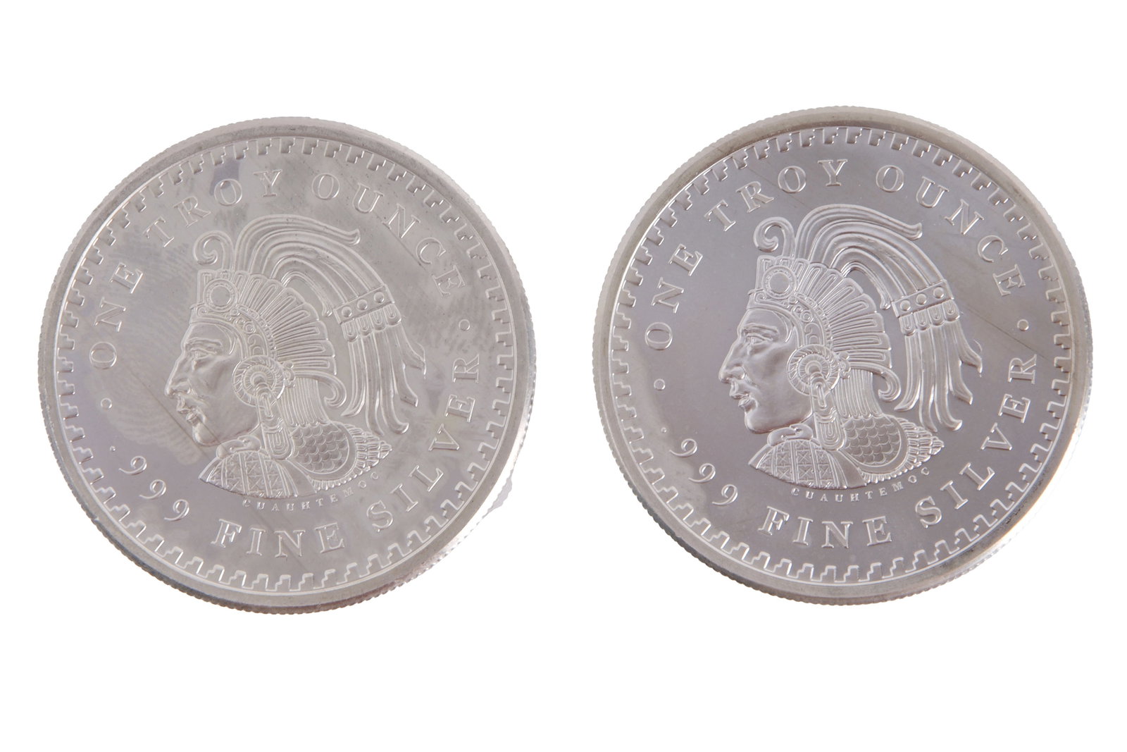 Two 1 Troy Ounce Fine Silver Aztec Rounds: Two .999 fine silver rounds. This lot has a reserve.