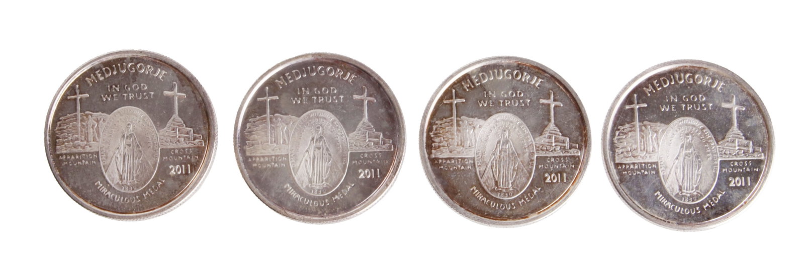 Four Half Ozt .999 Silver Medjugorje Rounds: Four half ounce rounds of .999 silver, featuring a design based off Medjugorje. Two ounces total.