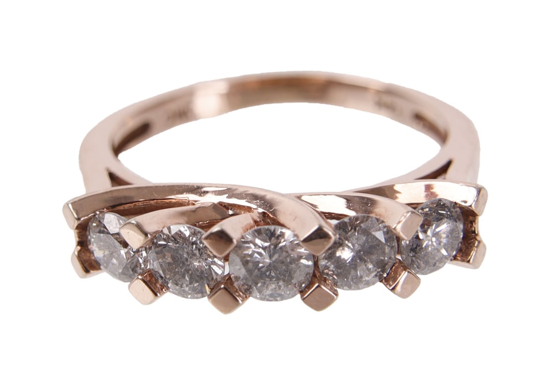 1 CTW 5 Diamond Rose Gold Ring Size 6: Stamped "14K" inside shank. Diamonds test electronically and measures approximately .18-.21 carat each. Size 6. Diamonds are approximately I2 and J-M in color. Shared Prong, trellis setting. This lot