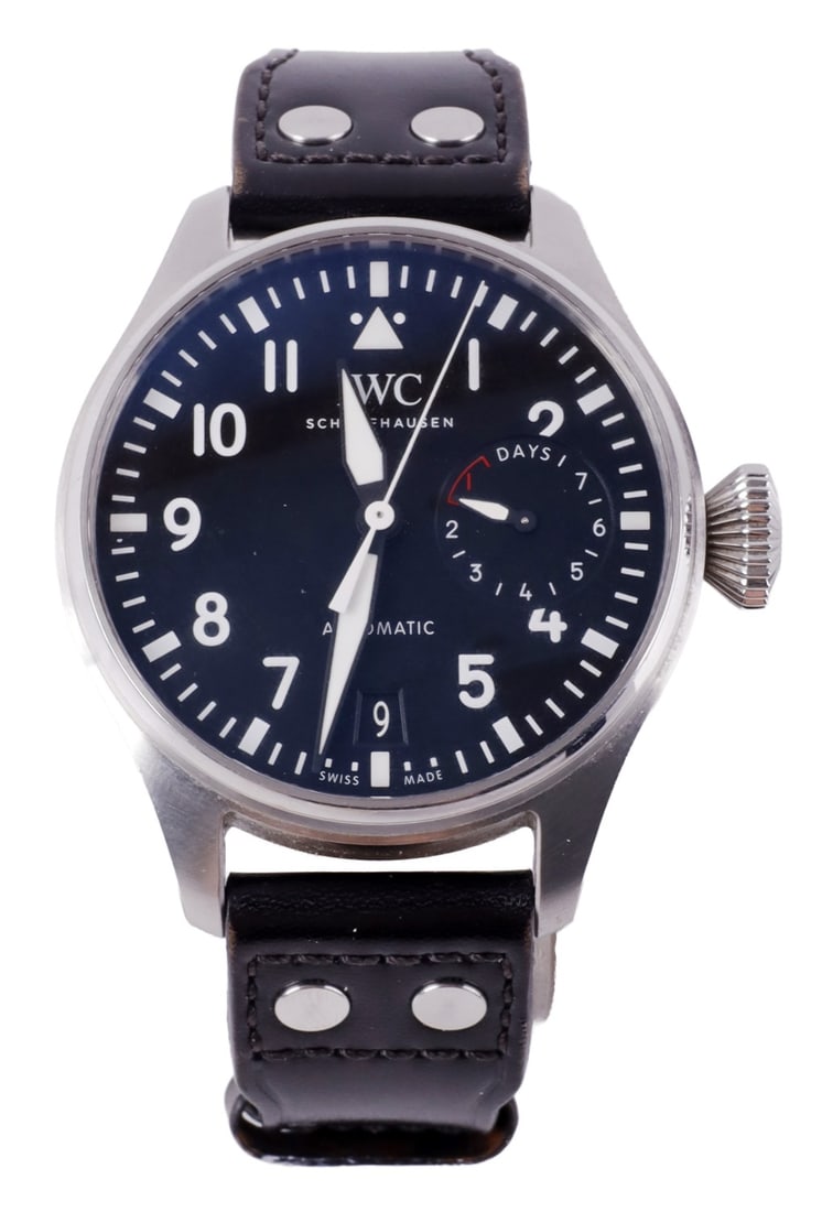 International Watch Company Big Pilot's Watch 46mm: IWC Big Pilot's watch with a blue dial, stainless steel frame, and leather band with metallic studs. 46 mm face. Automatic, self-winding movement. Scratch resistant sapphire. Blue dial with white Arab