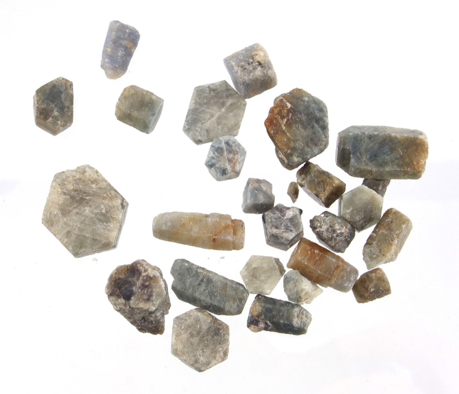 Over 200 Carats of Raw Montana Sapphires: Total of 217 carats of Montana sapphires. Number of stones in lot 25 largest is 31 ct measures 24.22x20.4x12.72 mm. Color of stones are blue to green.