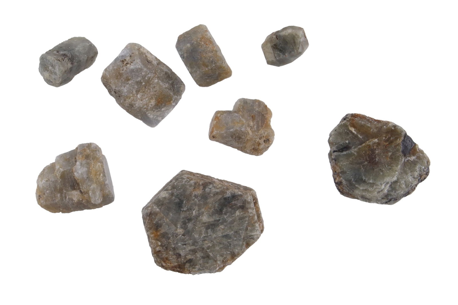 Over 200 Carats of Raw Montana Sapphires Large: Total of 220 carats of Montana sapphires. Eight stones in lot largest is 74.5 ct measures 25.8x23.4x9.81 mm. Color of stones are blue to green.