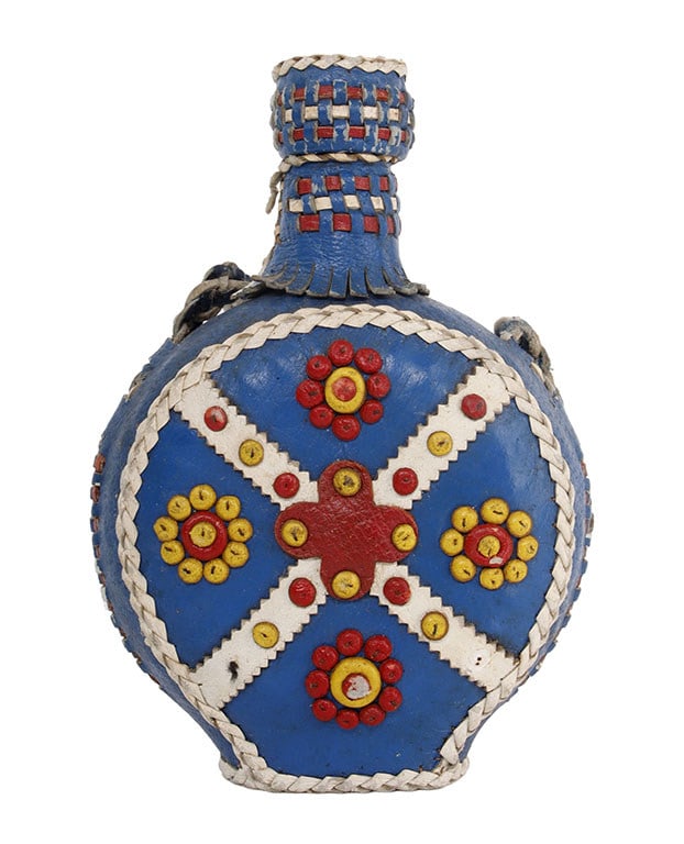 Serbian Antique Leather Rakija Bottle: A vintage Serbian bottle with hand crafted leather cover, traditional used for rakija and other alcoholic beverages. 6 inches tall.