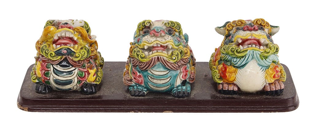 Set of Three Mounted Wucai Foo Dogs: A set of three mounted foo dogs, painted in the Wucai tradition. Bottom reads 'Lukang,' referencing the arts community in Taiwan. 5.25x1.5x1.5 inches.