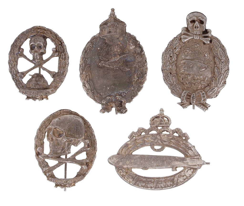 Storm Trooper Badges WWI Imperial German: A selection of five (5) badges from WWI, all German. Four reflect imagery of the storm troopers, the fifth is a Zeppelin observer.
