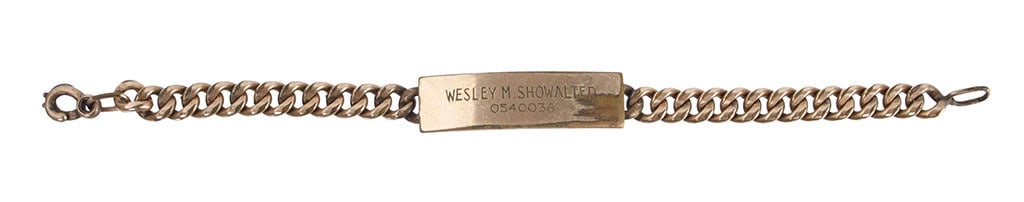 WWII US Army Pacific 12K GF Officer ID Bracelet: Officer's identification bracelet, 1/20 12K gold fill. Engraved "Wesley M. Showalter 0540036" and on reverse "All my love - Always 'Ronni.'" Showalter served as a first lieutenant in the Pacific Theat