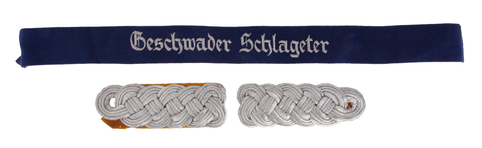 German Luftwaffe Cuff Title and Shoulder Boards: WWII shoulder boards and Jagdeschwader Schlageter cuff title. Non-fluorescing. Unauthenticated, sold as is. Jagdgeschwader 26 (JG 26), also known as ?Jagdgeschwader Schlageter,? was established on May