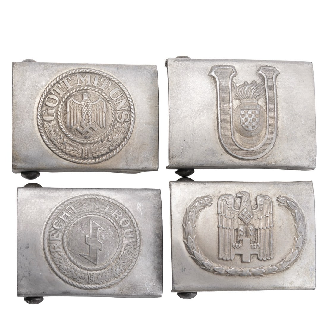 4 Belt Buckles Reichsadler WWII German Reich: A selection of four (4) belt buckles of the German Third Reich. 1) German Labor Front. 2) Der Stahlhelm. 3) Skull and crossbones. 4) Reichsadler.