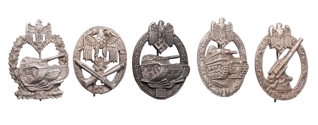 5 WWII German Badges Lot Tank Assault and General: A lot of five (5) badges from the German Third Reich: 1) Tank assault. 2) Tank assault (fifty assaults). 3) Tank assault (100 assaults). 4) Anti-aircraft. 5) General Assault (fifty assaults).