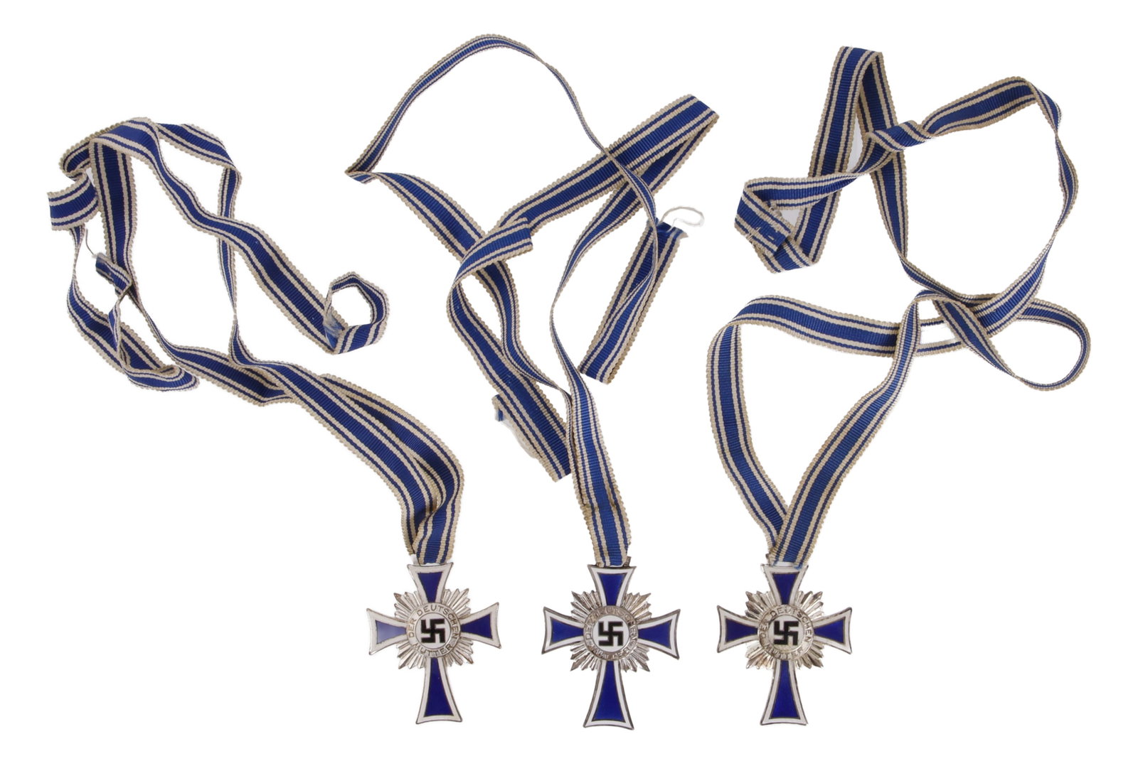 German Mother's Cross of Honour in Silver Lot of 3: Lot of three (3) pieces. Cross of Honour of the German Mother in silver, with ribbons.