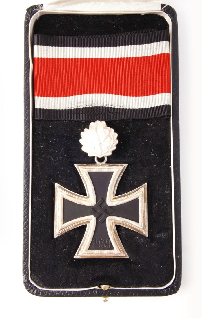 Knights Iron Cross & Oak Leaves WWII German Reich: 935 silver frame with lacquered magnetic core. 800 silver oak leaves included with maker mark 21. Reverse of cross is marked 935 and 4. It measures 2 5/8 inches with leaves. Never awarded. Intended fo