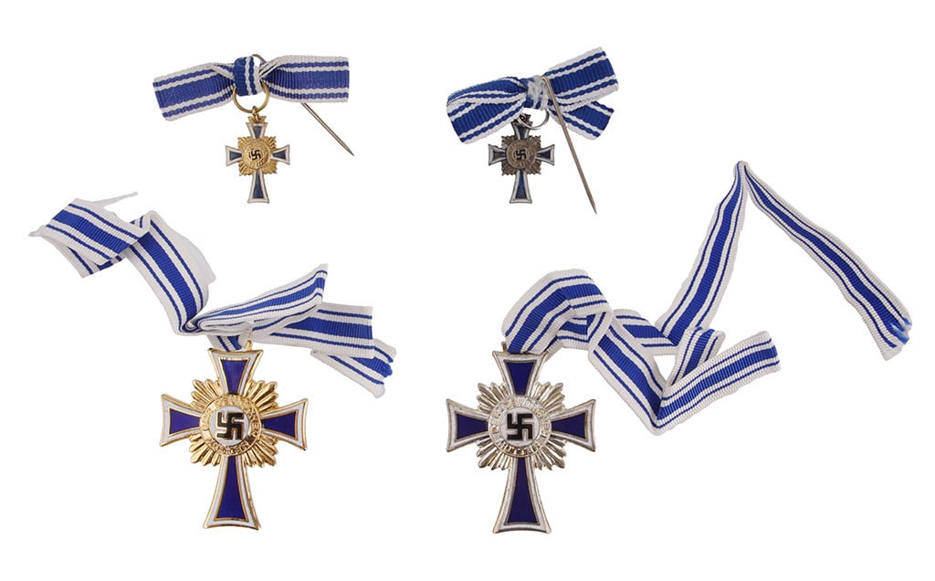 Mother's Cross Lot of 3 WWII German Third Reich: A lot of three (3) Mother's Crosses. 1) A Mother's Cross in silver grade. 2) A Mother's Cross in gold grade. 3) A mini Mother's Cross in sterling.