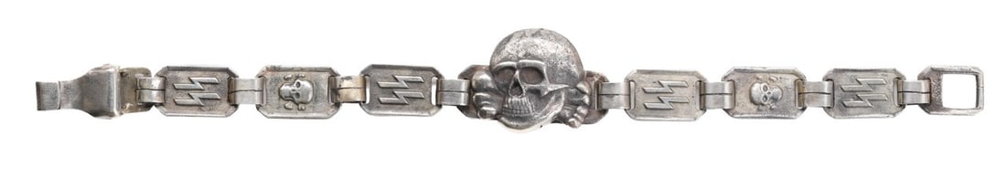 Waffen-SS Bracelet WWII German Reich: A bracelet for the Waffen-SS, with totenkopf and SS-Siegrunes. 9.25 inches.