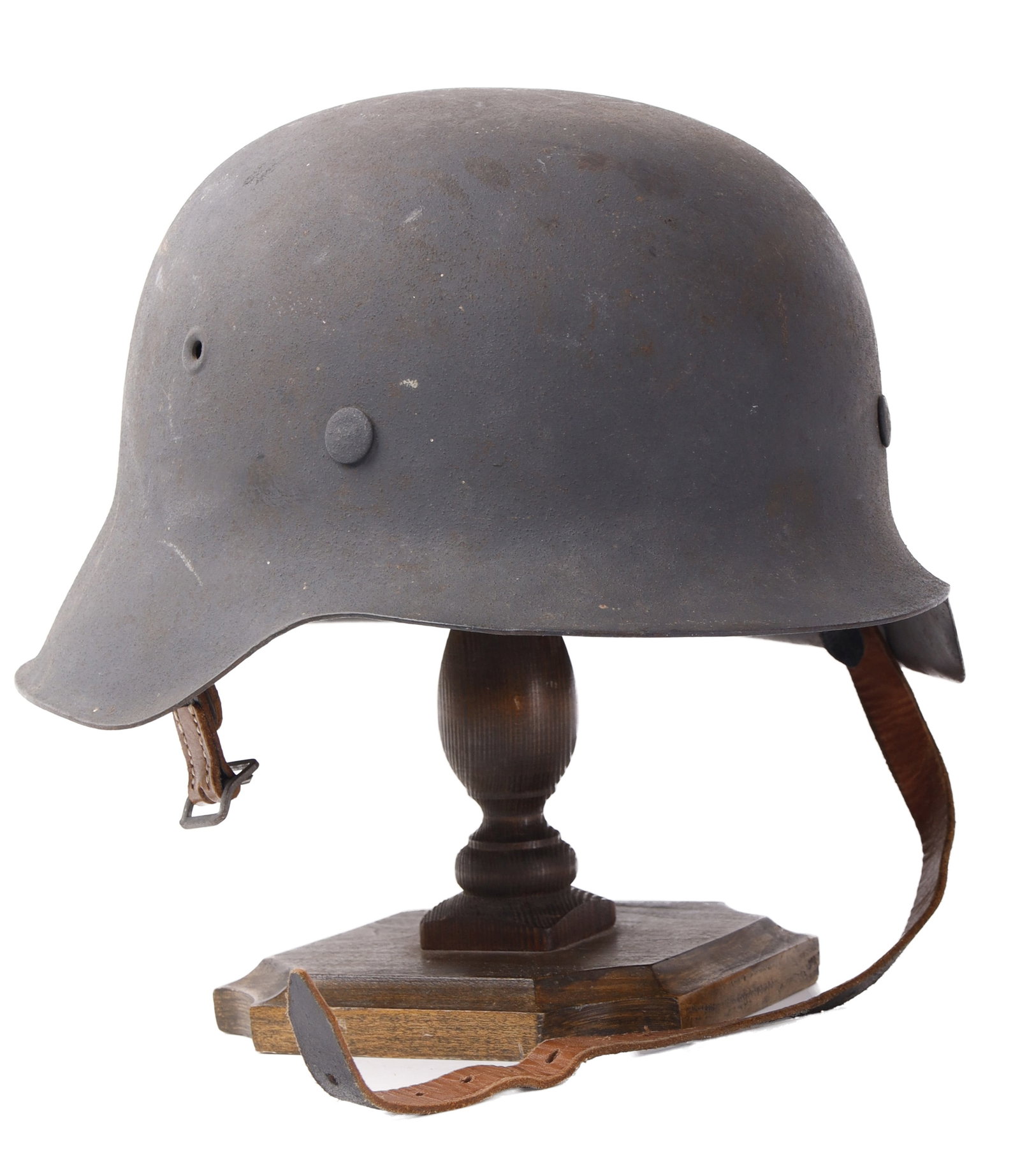 WWII Luftwaffe M42 Stahlhelm German Helmet: M42 Luftwaffe stahlhelm. Decal on left with leather liner and chin strap. Shell stamped 9 on rear and possibly ET66 or 68 but is heavily worn. Chin strap is marked C. Korn Alzey 1942.