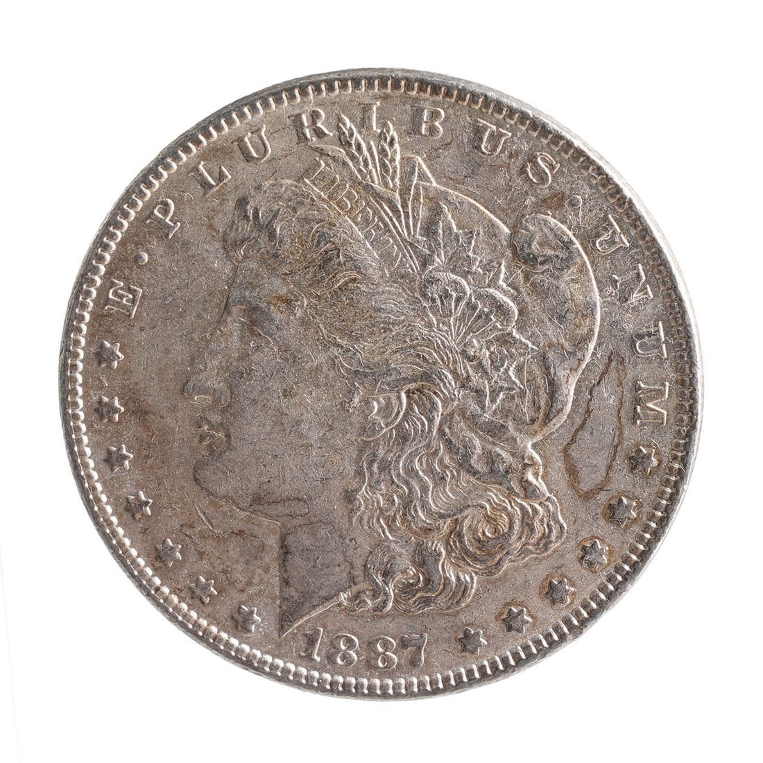 1887 US Morgan Silver Dollar Coin: 1887 Philadelphia mint. Metal: Silver Country of Origin: USA Year Minted: 1887 | This lot has a reserve.